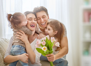 daughters with dad congratulate mom