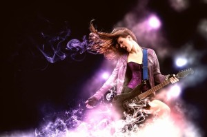 21648435 - young attractive rock girl playing the electric guitar