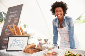 Female Bakery Stall Holder At Farmers Fresh Food Market