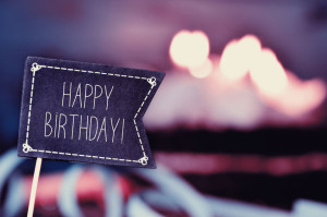 black flag with the text happy birthday