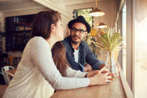 Young couple relaxing in a coffee shop.