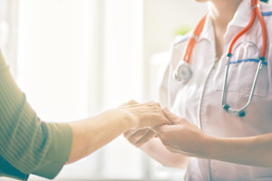 Female patient listening to doctor