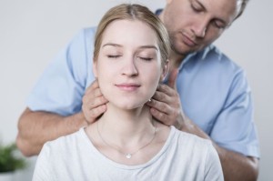 Woman havinh her neck massaged
