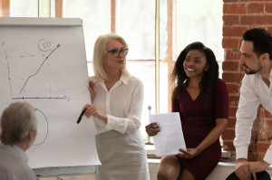 Female boss make presentation provide information sales statistics in graphs