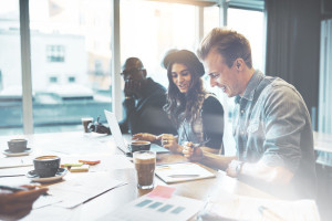 Diverse young business team in a high key office