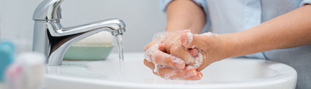 Woman washing hands
