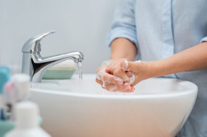 Woman washing hands