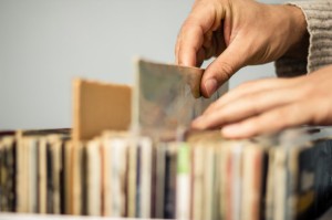 21705599 - male hands browsing record shop
