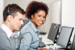 Female Employee Working In Call Center