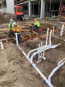 Members of our team laying groundwork plumbing, 2020
