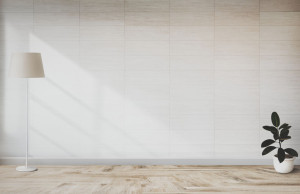 Lamp and a plant in an empty room wall mockup