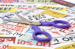 13971333 - scissors with grocery coupons