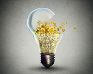 Creative technology communication concept lightbulb with gears