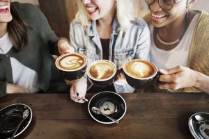 52403580 - women friends enjoyment coffee times concept