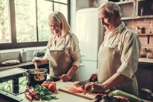 Old couple in kitchen