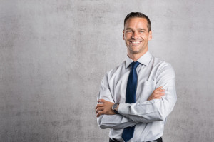 Proud businessman smiling