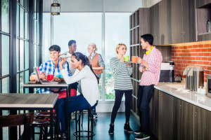 Team having coffee in lounge of start-up business