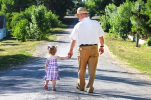 14310189 - grandfather and granddaughter are on the road