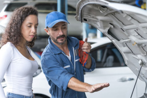 Auto services and Small business concepts. Mechanic reparing the