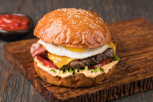 Burger on a wooden board