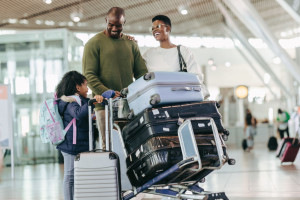 Young family waiting at airport