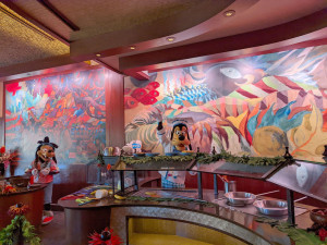 Disney Characters Goofy and Max work salad bar at the Aulani Hot