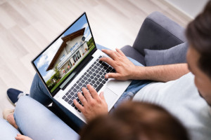 Couple Family Searching Real Estate Online