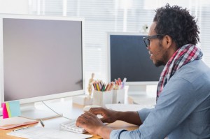 20591834 - creative business worker on computer in a modern office