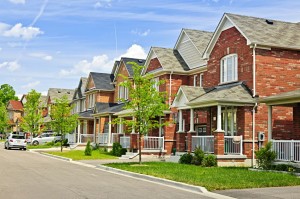 14384598 - suburban residential street with red brick houses