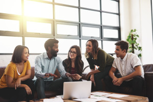 Im open to any ideas. Cropped shot of a group of young designers having a meeting in a modern office.