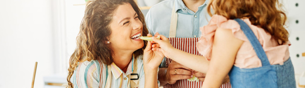 family child kitchen food daughter mother father cooking preparing breakfast happy together