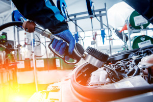 Engine oil change. Car repair. Auto background