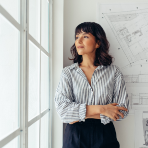 Portrait of woman entrepreneur at office CANVA