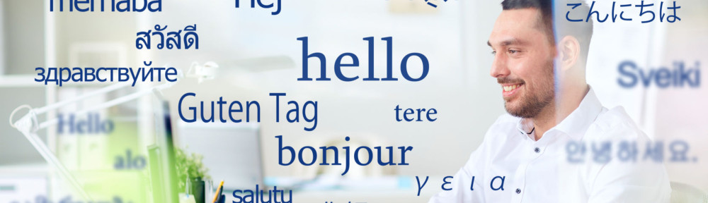 man with computer over words in foreign languages