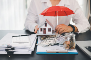 Concept business house finance protection office plan investment buy sell home ensuring idea financial security. residence agent hand protect purchase insurance and secure favorable loan deal.
